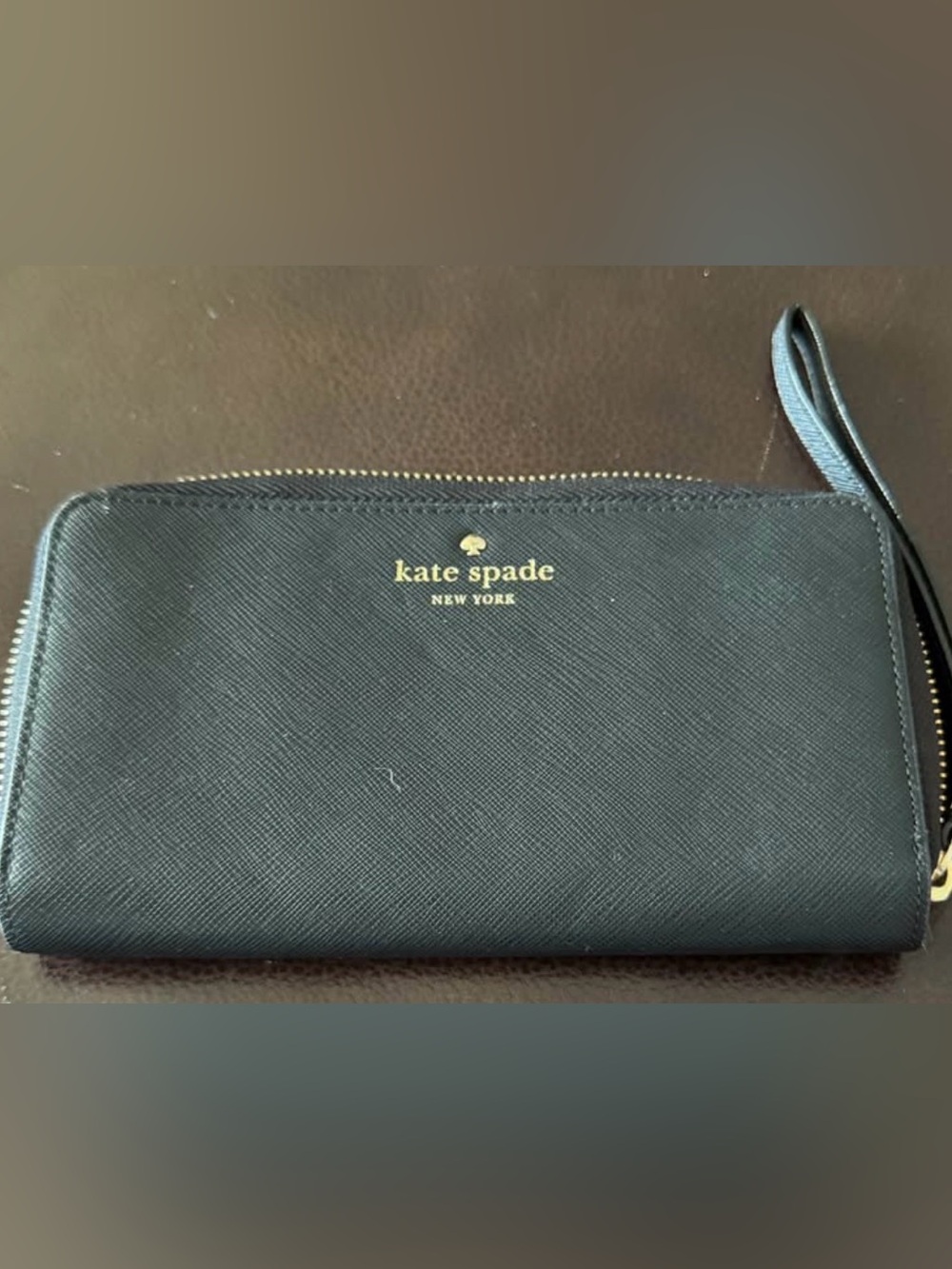 kate spade black wallet/wristlet with gold logo